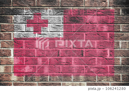 Tonga flag on a brick wall background 106241280