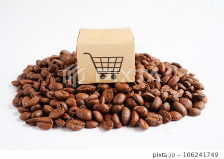Shopping cart box on coffee beans, shopping online for export or import. Shopping cart box on coffee beans, shopping online for export or import. 106241749