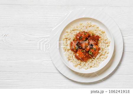Baked Honey Sesame Chicken with brown rice Baked Honey Sesame Chicken with brown rice 106241918