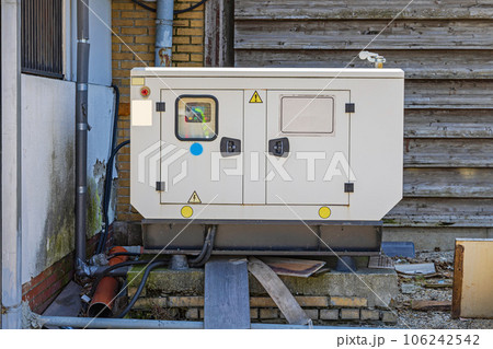 Power Generator Behind Building 106242542