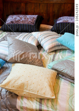 Pillows on bed Pillows on bed 106242849