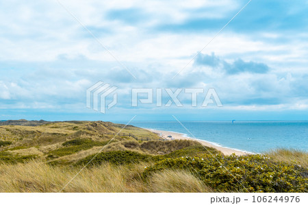 Landscape on Sylt island with the North Sea and the marram grass hills Landscape on Sylt island with the North Sea and the marram grass hills 106244976