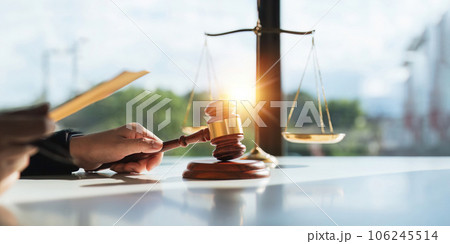 Photography of a judge hold judges gavel and old scales concept of justice lawyer concept Judge Photography of a judge hold judges gavel and old scales concept of justice lawyer concept Judge 106245514
