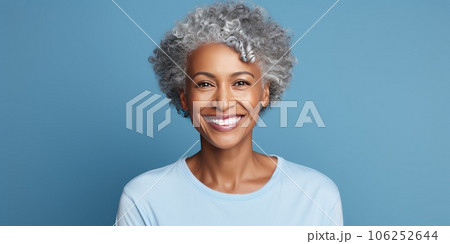 Middle-aged woman with a short gray hairdo looking at camera. Middle-aged woman with a short gray hairdo looking at camera. 106252644