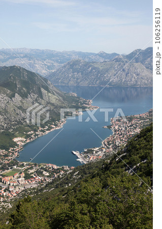 Bay of Kotor with high mountains plunge into Adriatic sea and Historic town of Kotor, Montenegro Bay of Kotor with high mountains plunge into Adriatic sea and Historic town of Kotor, Montenegro 106256119
