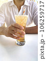 man drinking refreshing drink in a bar 106259717