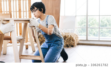 Southeast asian family father and son living together homeschooling 106261782