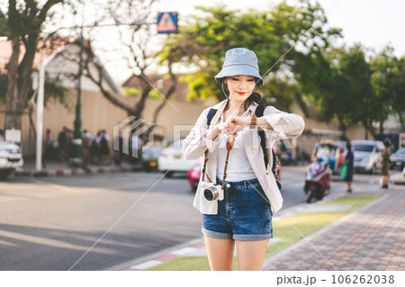 Woman travel at outdoors with modern technology in southeast asia trip Woman travel at outdoors with modern technology in southeast asia trip 106262038