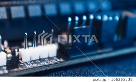 Motherboard hardware components in blue light 106265339