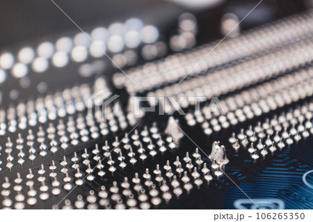 Desktop PC motherboard backside close-up with pins Desktop PC motherboard backside close-up with pins 106265350