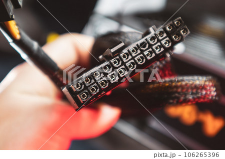 Cable connector from PC power supply unit close-up 106265396