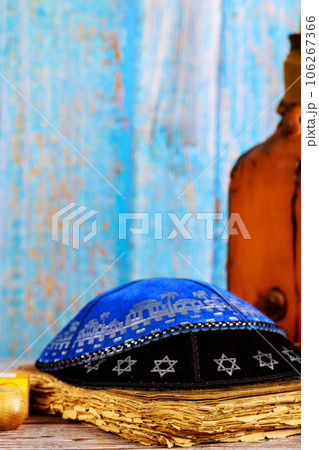 Religious symbols for holly days in synagogue Jewish holiday prayer book with shofar, kippah 106267366