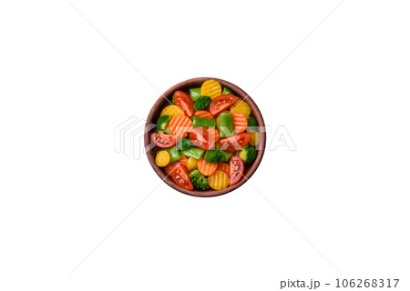 Salad of fresh and steamed vegetables cherry tomatoes, broccoli and carrots 106268317