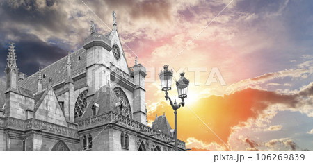 Great gothic church of Saint Germain l Auxerrois (against the background of a sky at sunset), Paris, France 106269839