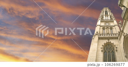 Great gothic church of Saint Germain l Auxerrois (against the background of a sky at sunset), Paris, France 106269877