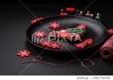 Beautiful festive Christmas gingerbread made by hand with decoration elements 106270298