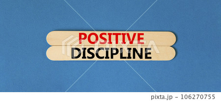 Positive discipline symbol. Concept words Positive discipline on beautiful wooden stick. Beautiful blue table blue background. Business psychology positive discipline concept. Copy space. Positive discipline symbol. Concept words Positive discipline on beautiful wooden stick. Beautiful blue table blue background. Business psychology positive discipline concept. Copy space. 106270755