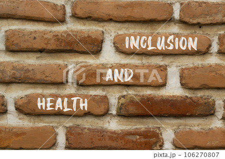 Health and inclusion symbol. Concept words Health and inclusion on beautiful brown brick. Beautiful red brown brickwall background. Business motivational health and inclusion concept. Copy space. 106270807