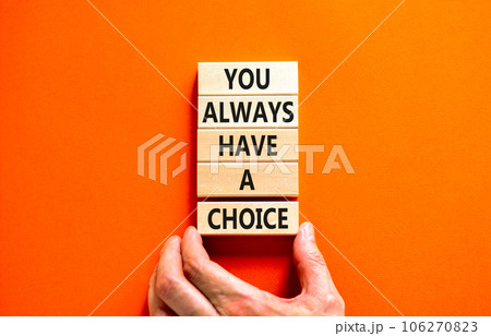 You always have choice symbol. Concept words You always have a choice on wooden block. Beautiful orange table orange background. Businessman hand. Business you always have choice concept. Copy space. 106270823