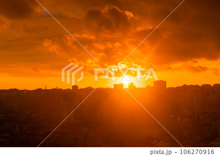 Amazing sunset sky with clouds and the setting sun over the city, Istanbul 106270916