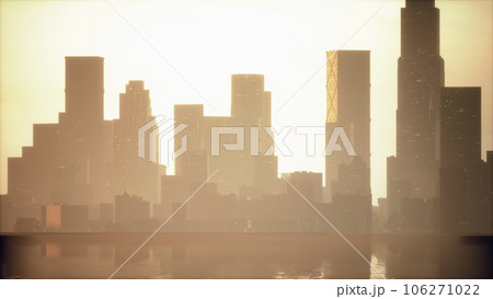 Beautiful sun ray over downtown during hazy sunrise 106271022