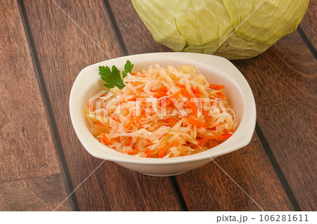 Sauerkraut - pickled cabbage in the bowl Sauerkraut - pickled cabbage in the bowl 106281611