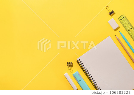 School supplies on yellow background. Back to school concept. Top view. Copy space. 106283222