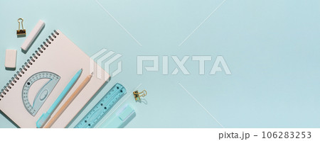 School supplies on blue background. Back to school concept. Top view. Copy space. School supplies on blue background. Back to school concept. Top view. Copy space. 106283253