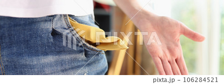 Woman in denim shorts shows her empty pocket. Woman in denim shorts shows her empty pocket. 106284521
