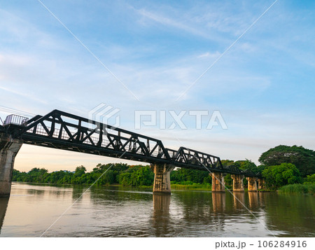 The train is passing through the Death Railway Bridge over the River Kwai in Kanchanaburi. During World War Two Japan constructed railway from Thailand to Burma This is now know the Death Railway. The train is passing through the Death Railway Bridge over the River Kwai in Kanchanaburi. During World War Two Japan constructed railway from Thailand to Burma This is now know the Death Railway. 106284916