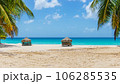 beach with water bungalows at maldives 106285535