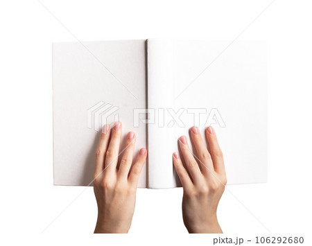 Hands holding open book mockup, blank hard cover mock-up isolated on white background 106292680