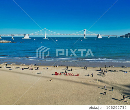 Aerial view of gwangalli beach and gwangandaegyo bridge, Busan, South Korea, Asia. Aerial view of gwangalli beach and gwangandaegyo bridge, Busan, South Korea, Asia. 106292752
