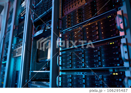 Server rack with supercomputer hardware in big data center inside closeup 106295487