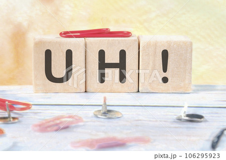 uh signs on wooden cubes on a light background uh signs on wooden cubes on a light background 106295923