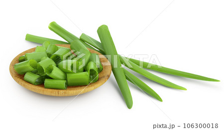 Green onion in wooden bowl isolated on the white background with full depth of field Green onion in wooden bowl isolated on the white background with full depth of field 106300018