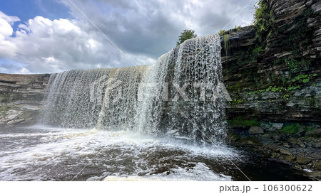 A beautiful big waterfall in Estonia on a clear sunny day A beautiful big waterfall in Estonia on a clear sunny day 106300622