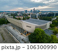 Aerial view of the Soviet Abandoned Palace of Concerts and Sports and modern city center in Vilnius 106300990