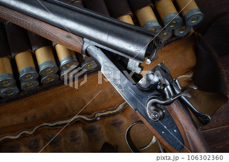 Antique 12-gauge break-action smooth-bored shotgun with paper cases. 106302360