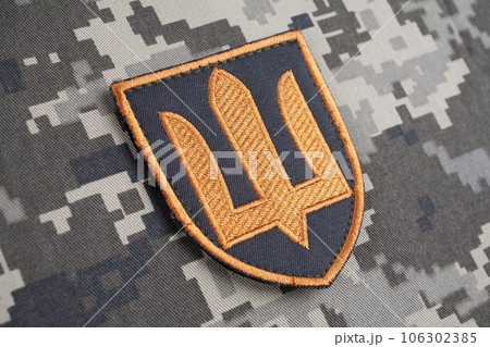 KYIV, UKRAINE - October 5, 2022. Russian invasion in Ukraine 2022. Ukraine Army uniform shoulder sleeve insignia badge. 106302385