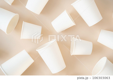 Cardboard cups for coffee or tea flat lay on neutral background. Cardboard cups for coffee or tea flat lay on neutral background. 106303063