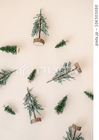 Winter holidays arrangement. Toy fir trees layout. Winter holidays arrangement. Toy fir trees layout. 106303080