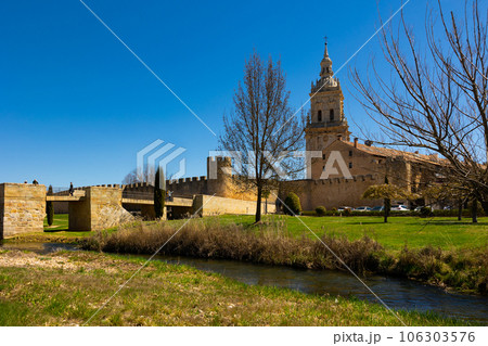 Burgo de Osma Cathedral, landscape under blue sky Burgo de Osma Cathedral, landscape under blue sky 106303576