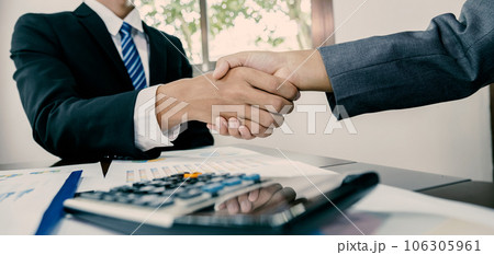 hands shake after business office executives are interviewing job applicants in the meeting room hands shake after business office executives are interviewing job applicants in the meeting room 106305961