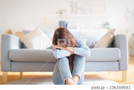 Young asian woman upset , sadness and frustrated by problem with work or relationships Young asian woman upset , sadness and frustrated by problem with work or relationships 106309081