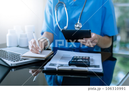 Medicine doctor hand working with modern digital tablet computer interface as medical network concept. 106310991