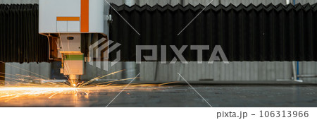 CNC machine. Laser cutting of metal. Sparks. 106313966