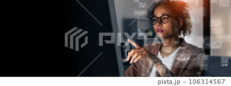 オフィスで作業する外国人女性とデジタルデータ　バナー・広告向け横長ビジュアル 106314567