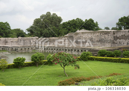 Ruins near Kapur Talao, situated in the fort opposite Jahaz Mahal, built by Sultan Ghiyasuddin Khilji, Mandu, Madhya Pradesh, India Ruins near Kapur Talao, situated in the fort opposite Jahaz Mahal, built by Sultan Ghiyasuddin Khilji, Mandu, Madhya Pradesh, India 106316030