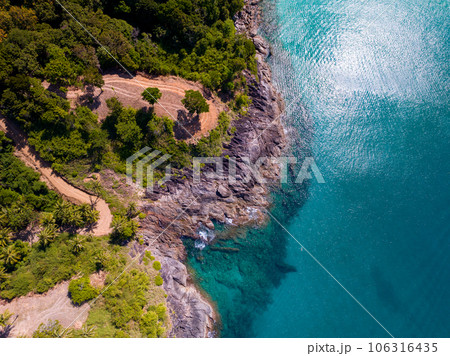 Aerial view seashore with mountains at Phuket Thailand, Beautiful seacoast view at open sea in summer season, Nature recovered Environment and Travel background 106316435